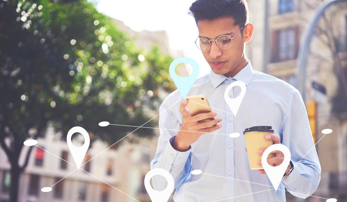 Man searching via app food restaurants near his location. Maps application for smartphone. Infographics tags with virtual map.