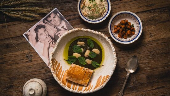 Food from Mutra with a black and white wedding photo.