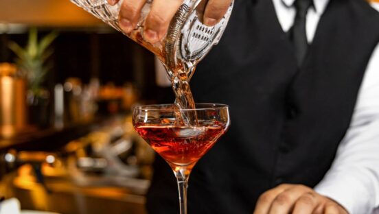Red Phone Booth’s carefully curated cocktail program features classics like the Smoked Old Fashioned, the Bramble, and the Aviation cocktail.