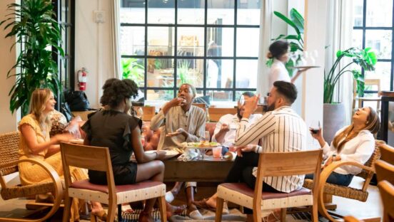 Sixty Vines guests eating and drinking.