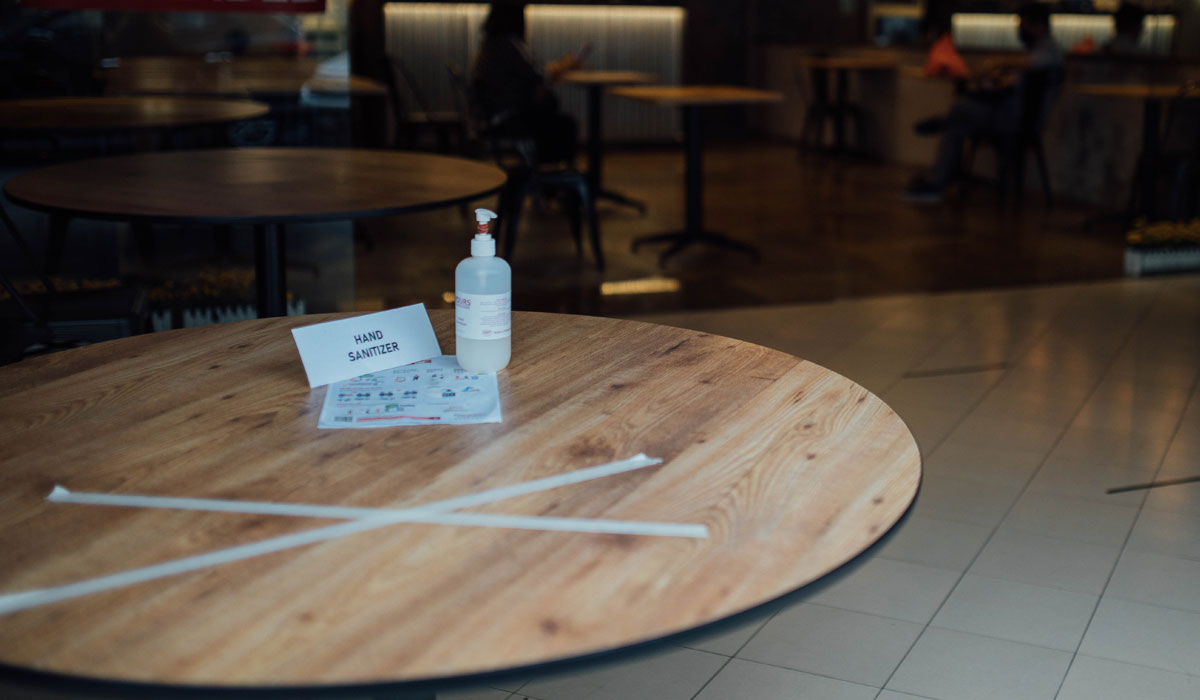 A Table With Hand Sanitizer On It