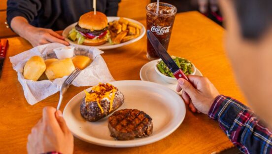 Texas Roadhouse food on a table.